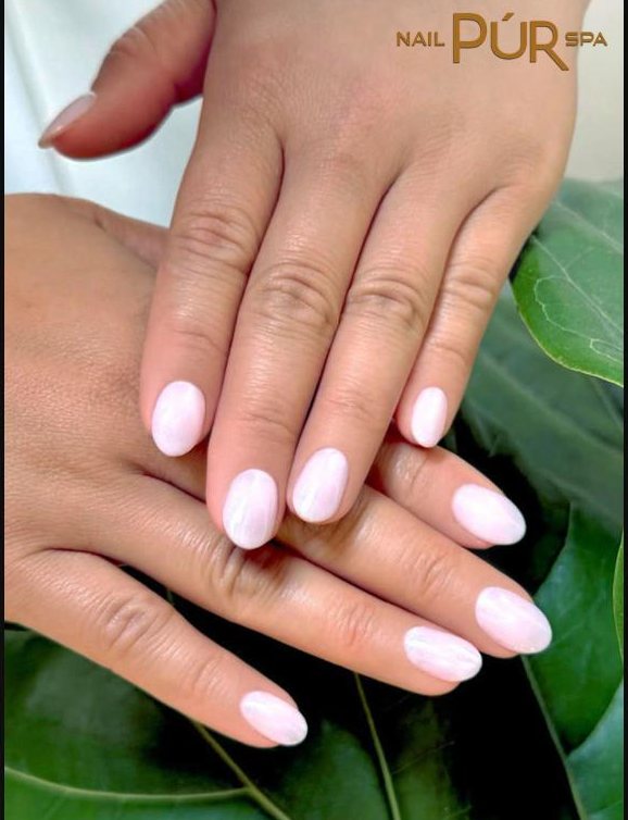 Soft pink short round gel manicure